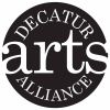 Black circular logo with the words "Decatur Arts Alliance" in white, bold and stylized letters.